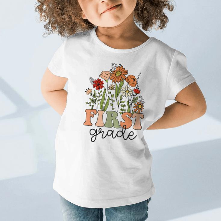 Groovy First Grade Wildflowers Back To School 1st Grade Graphic Toddler T-Shirt Groovy First Grade Wildflowers Back To School 1st Grade Graphic Toddler T-Shirt