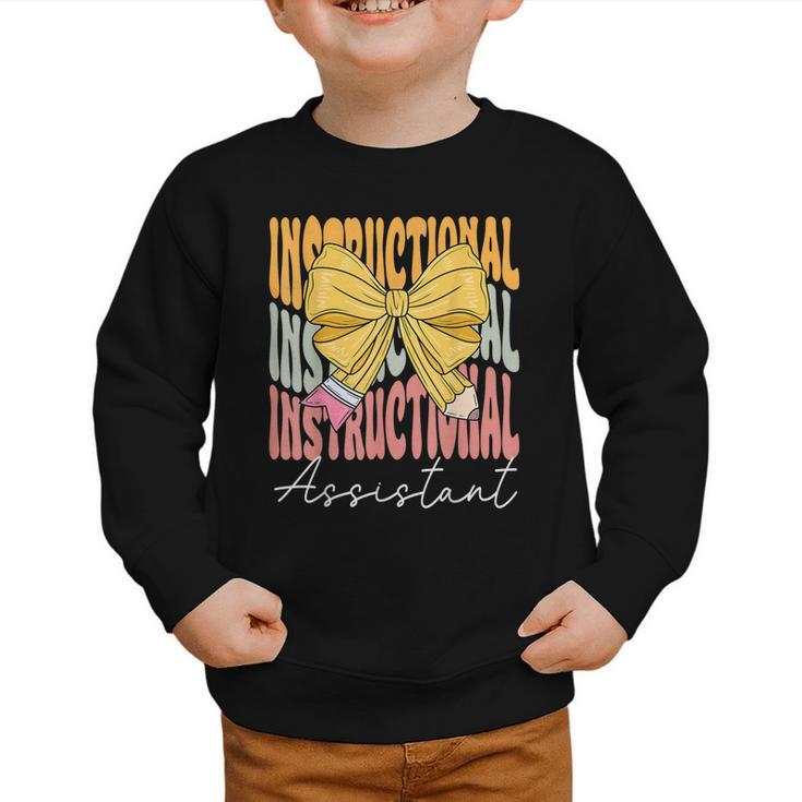 Instructional Assistant Groovy Coquette Bow Back To School Graphic Toddler Sweatshirt