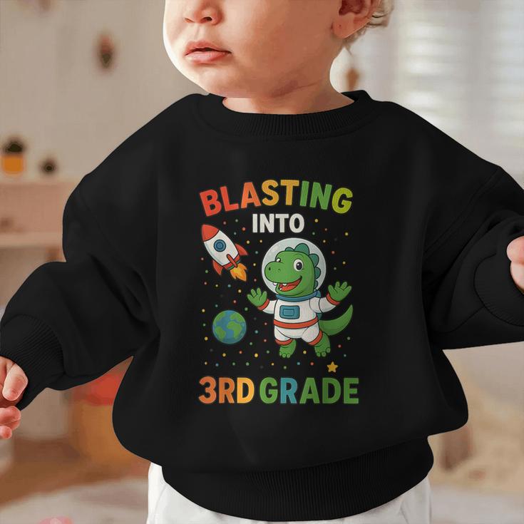 Blasting Into 3rd Grade Dinosaur Astronaut Back To School Graphic Toddler Sweatshirt Blasting Into 3rd Grade Dinosaur Astronaut Back To School Graphic Toddler Sweatshirt