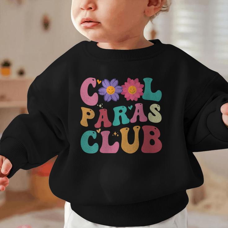 Cool Paras Club Paraprofessional Groovy Back To School Graphic Toddler Sweatshirt Cool Paras Club Paraprofessional Groovy Back To School Graphic Toddler Sweatshirt