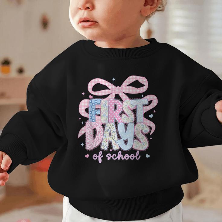 Coquette Bow Happy First Day Of School Back To School Retro Graphic Toddler Sweatshirt Coquette Bow Happy First Day Of School Back To School Retro Graphic Toddler Sweatshirt