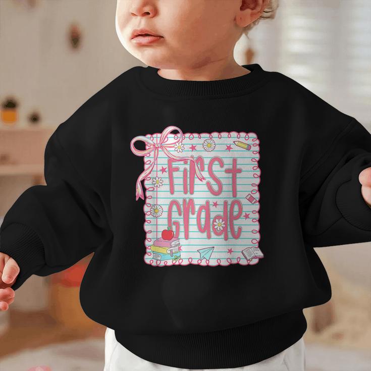 First Grade Coquette Bow Pink Preppy Back To School Girls Graphic Toddler Sweatshirt First Grade Coquette Bow Pink Preppy Back To School Girls Graphic Toddler Sweatshirt