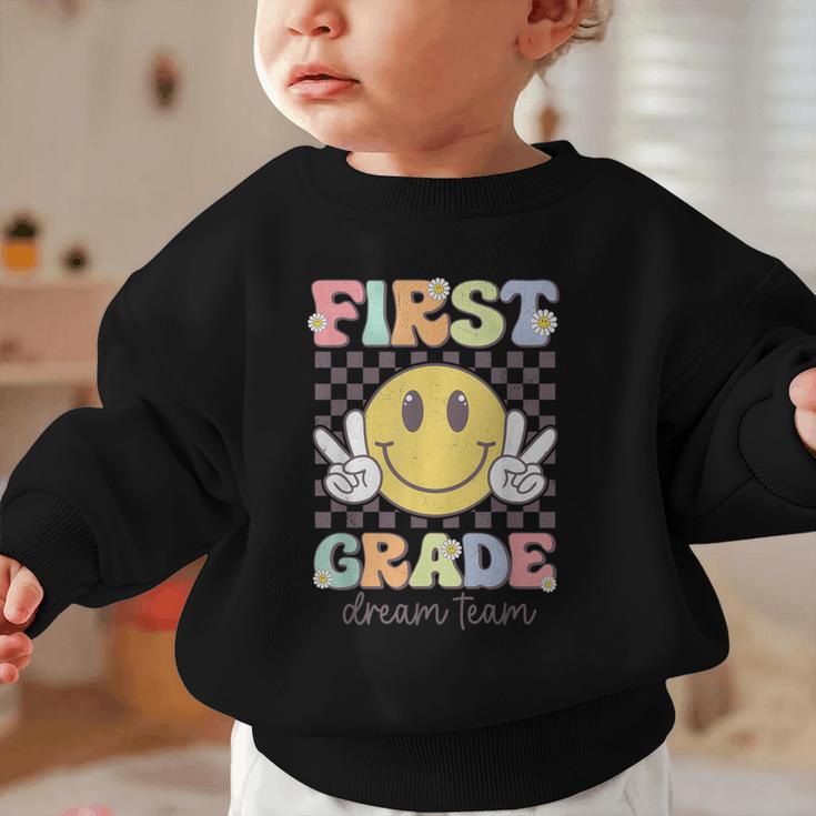 First Grade Dream Team Smile Face Back To School 1st Grade Graphic Toddler Sweatshirt First Grade Dream Team Smile Face Back To School 1st Grade Graphic Toddler Sweatshirt