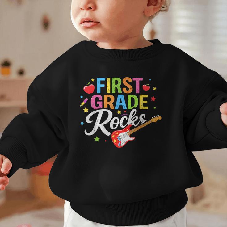 First Grade Rocks Colorful Back To School Guitar Graphic Toddler Sweatshirt First Grade Rocks Colorful Back To School Guitar Graphic Toddler Sweatshirt