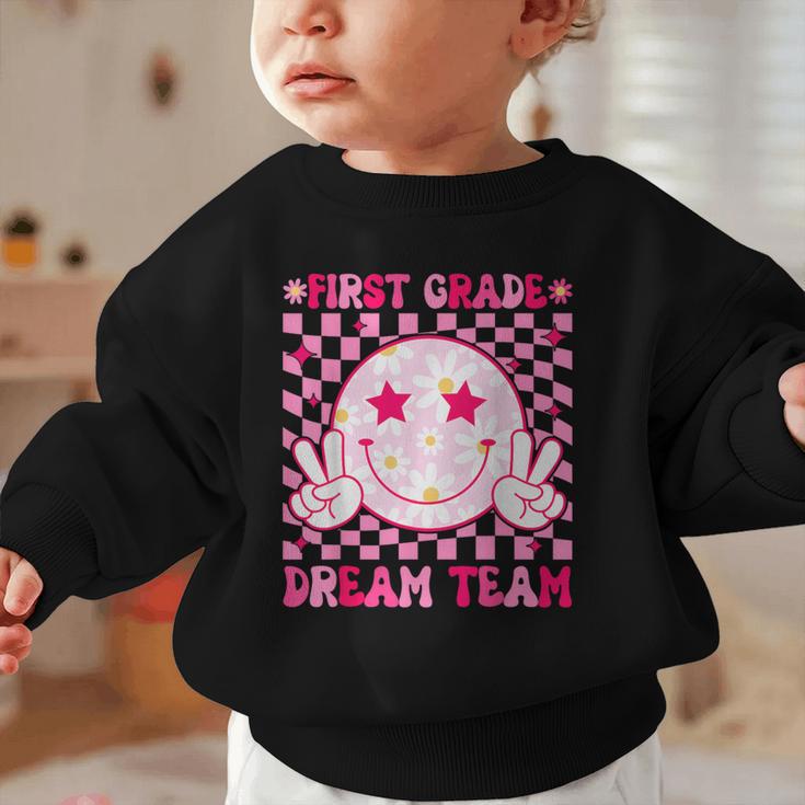 Groovy First Grade Dream Team Back To School 1st Grade Squad Graphic Toddler Sweatshirt