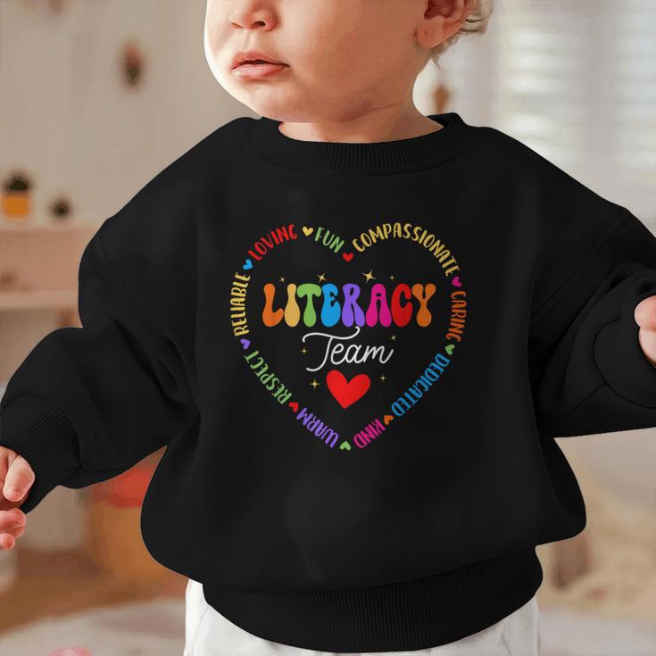 Groovy Literacy Team Reading Appreciation Back To School Graphic Toddler Sweatshirt
