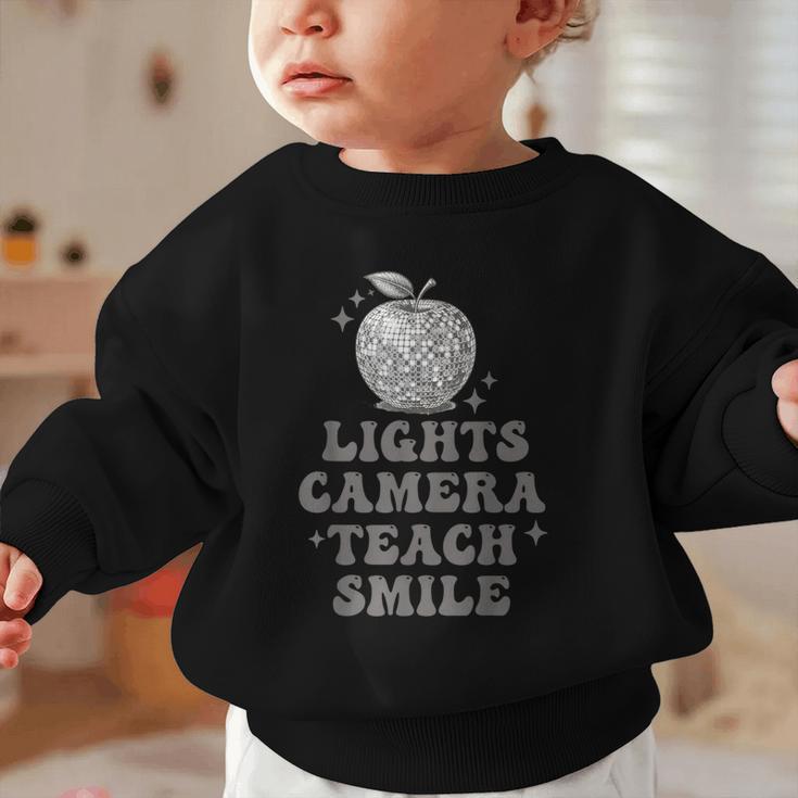 Lights Camera Teach Smile Disco-Ball Back To School Outfit Graphic Toddler Sweatshirt Lights Camera Teach Smile Disco-Ball Back To School Outfit Graphic Toddler Sweatshirt