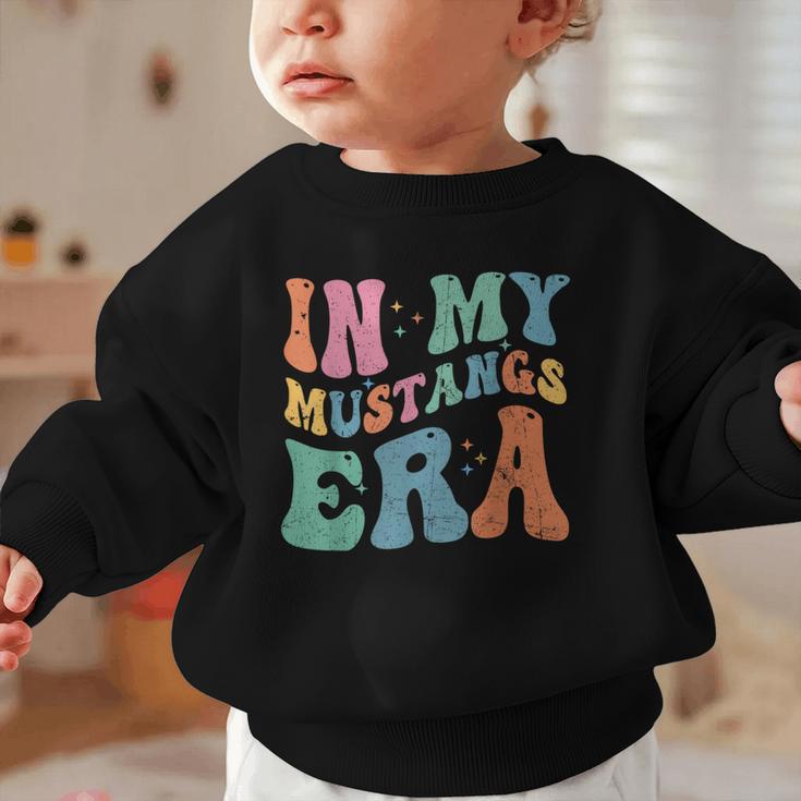 In My Mustangs Era Back To School Spirit Game Retro Groovy Graphic Toddler Sweatshirt In My Mustangs Era Back To School Spirit Game Retro Groovy Graphic Toddler Sweatshirt