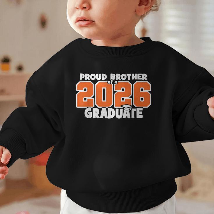 Proud Brother Of 2026 Graduate Matching Back To School O Graphic Toddler Sweatshirt