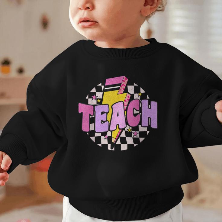Retro Checkered Teach Pencil Lightning Back To School Graphic Toddler Sweatshirt Retro Checkered Teach Pencil Lightning Back To School Graphic Toddler Sweatshirt