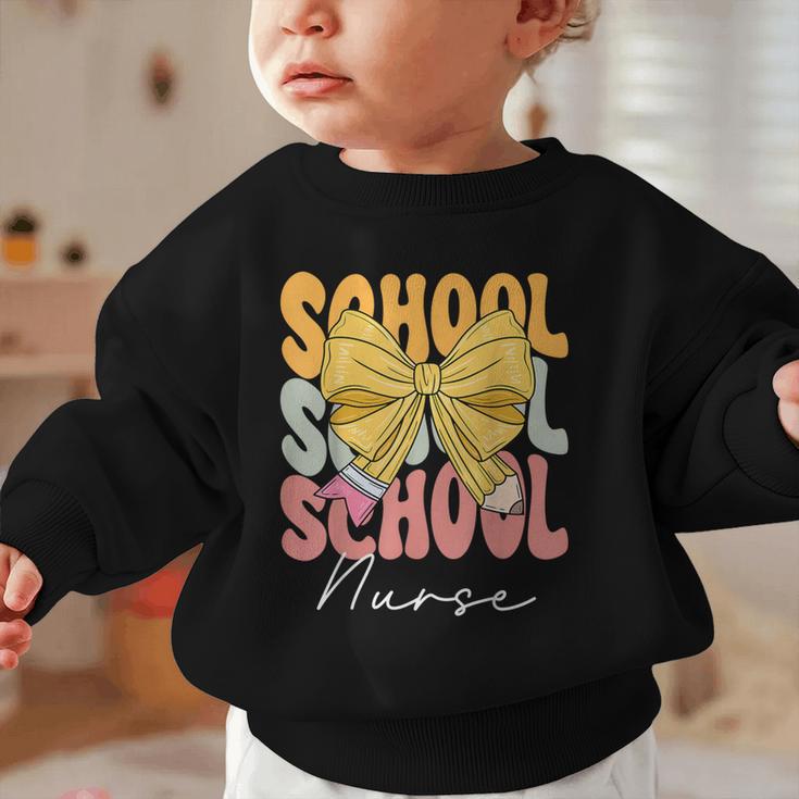 School Nurse Groovy Coquette Bow Cute Back To School Graphic Toddler Sweatshirt