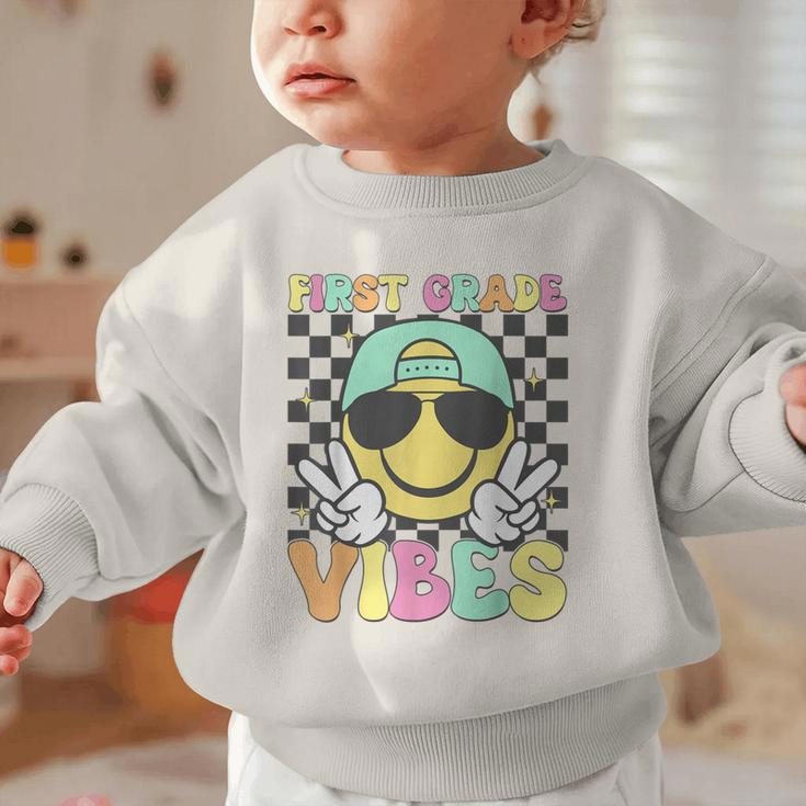 1st Grade Vibes Smile Face Back To School First Grade Graphic Toddler Sweatshirt 1st Grade Vibes Smile Face Back To School First Grade Graphic Toddler Sweatshirt