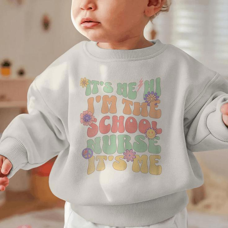 Back To School Nurse It's Me Hi I'm The School Nurse Graphic Toddler Sweatshirt Back To School Nurse It's Me Hi I'm The School Nurse Graphic Toddler Sweatshirt