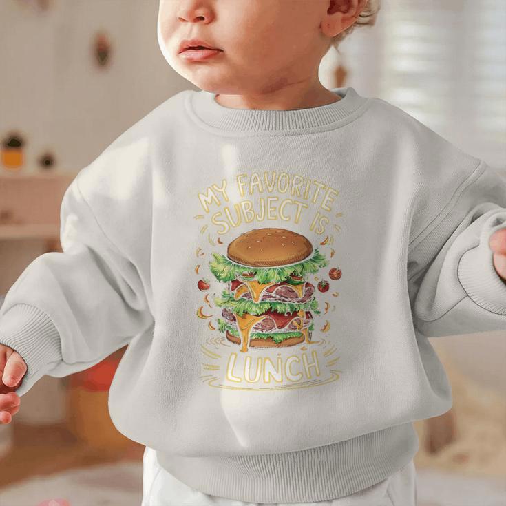 My Favorite Subject Is Lunch Hamburger Back To School Premium Tri-Blend Graphic Toddler Sweatshirt My Favorite Subject Is Lunch Hamburger Back To School Premium Tri-Blend Graphic Toddler Sweatshirt
