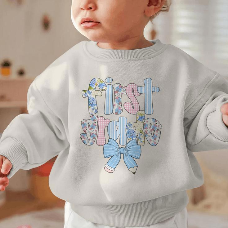 First Grade Coquette Bow Pencil First Day Back To School Performance Graphic Toddler Sweatshirt First Grade Coquette Bow Pencil First Day Back To School Performance Graphic Toddler Sweatshirt