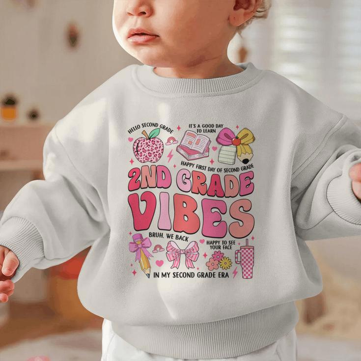 Girls 2nd Grade Vibes Coquette Pink Bow Back To School Graphic Toddler Sweatshirt Girls 2nd Grade Vibes Coquette Pink Bow Back To School Graphic Toddler Sweatshirt