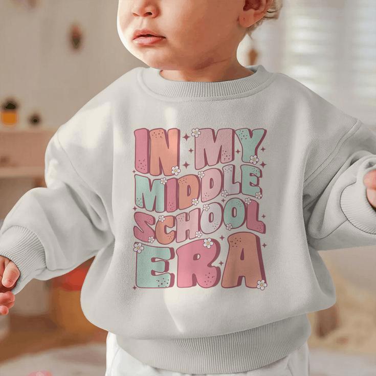 In My Middle School Era Cute Groovy First Day Back To School Graphic Toddler Sweatshirt In My Middle School Era Cute Groovy First Day Back To School Graphic Toddler Sweatshirt
