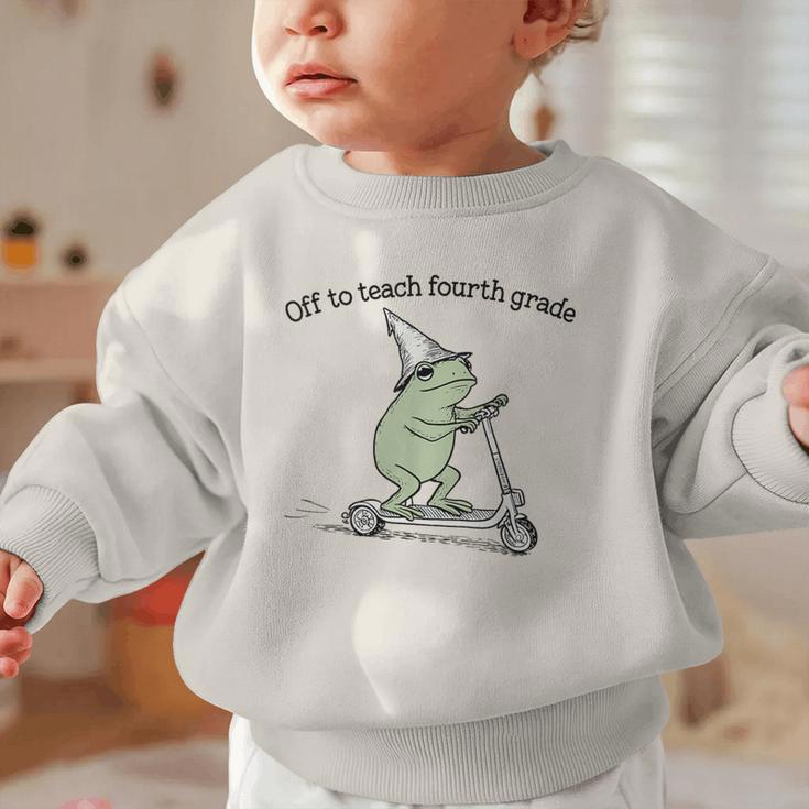 Off To Teach Fourth Grade Froggy Cute Frog Back To School Graphic Toddler Sweatshirt Off To Teach Fourth Grade Froggy Cute Frog Back To School Graphic Toddler Sweatshirt