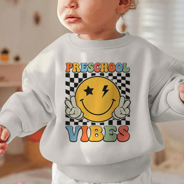 Preschool Vibes Retro Groovy Back To School Pre-K Graphic Toddler Sweatshirt Preschool Vibes Retro Groovy Back To School Pre-K Graphic Toddler Sweatshirt
