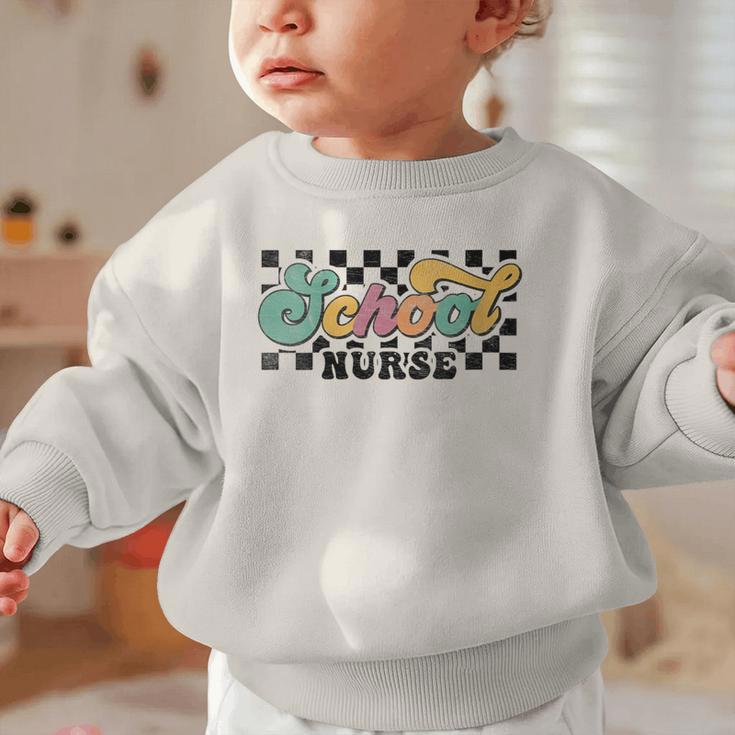 Retro Checkered School Nurse Squad Back To School Graduation Graphic Toddler Sweatshirt Retro Checkered School Nurse Squad Back To School Graduation Graphic Toddler Sweatshirt
