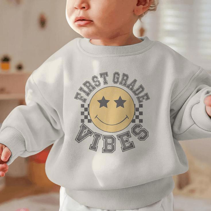 Retro First Grade Vibes Smile Face Back To School 1st Grade Graphic Toddler Sweatshirt