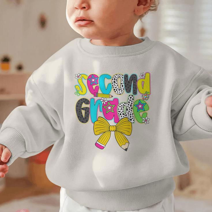 Second Grade Coquette Bow First Day Of School Back To School Performance Graphic Toddler Sweatshirt Second Grade Coquette Bow First Day Of School Back To School Performance Graphic Toddler Sweatshirt