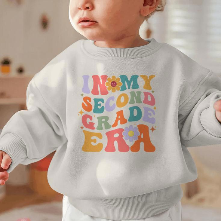 In My Second Grade Era Back To School Retro Groovy 2nd Grade Graphic Toddler Sweatshirt In My Second Grade Era Back To School Retro Groovy 2nd Grade Graphic Toddler Sweatshirt
