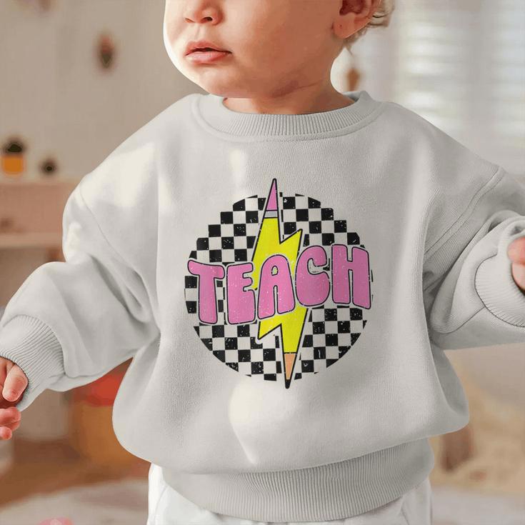Women Checkered Teach Pencil Lightning Bolt Back To School Graphic Toddler Sweatshirt Women Checkered Teach Pencil Lightning Bolt Back To School Graphic Toddler Sweatshirt