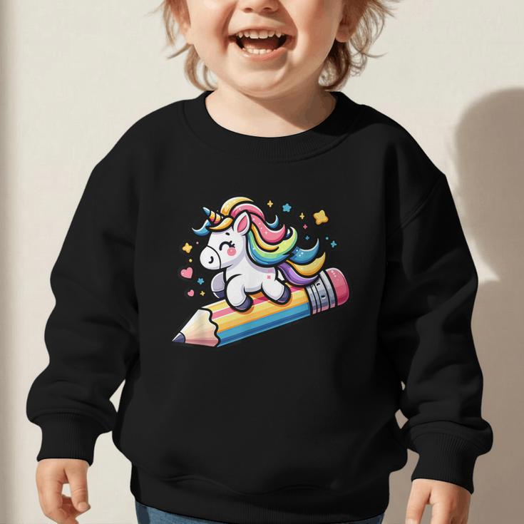 Back To School Unicorn Riding A Pencil Graphic Toddler Sweatshirt Back To School Unicorn Riding A Pencil Graphic Toddler Sweatshirt