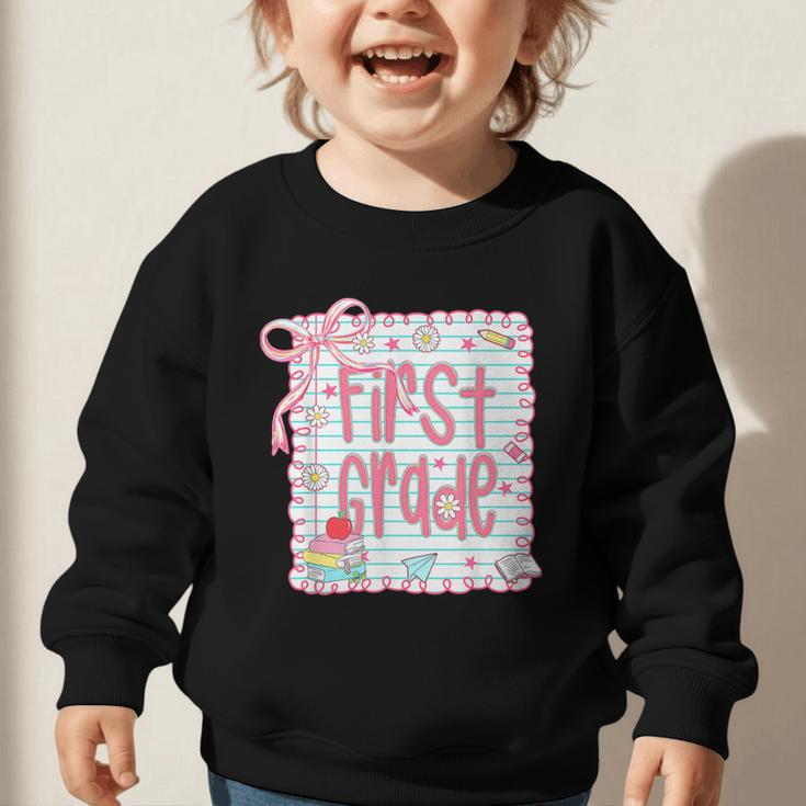 First Grade Coquette Bow Pink Preppy Back To School Girls Graphic Toddler Sweatshirt First Grade Coquette Bow Pink Preppy Back To School Girls Graphic Toddler Sweatshirt