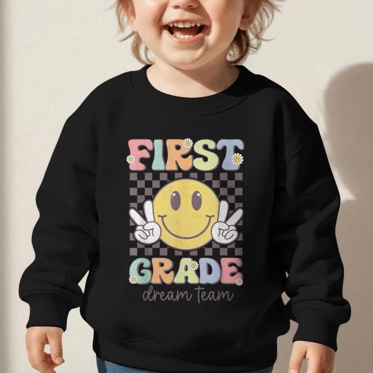 First Grade Dream Team Smile Face Back To School 1st Grade Graphic Toddler Sweatshirt First Grade Dream Team Smile Face Back To School 1st Grade Graphic Toddler Sweatshirt