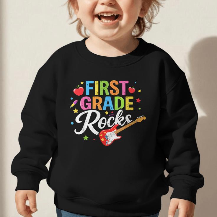 First Grade Rocks Colorful Back To School Guitar Graphic Toddler Sweatshirt First Grade Rocks Colorful Back To School Guitar Graphic Toddler Sweatshirt