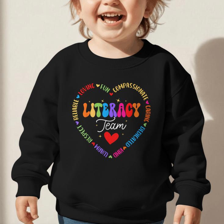 Groovy Literacy Team Reading Appreciation Back To School Graphic Toddler Sweatshirt