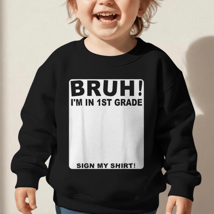 Happy Back To School Boys Girls Bruh Im In 1st Grade Sign My Graphic Toddler Sweatshirt Happy Back To School Boys Girls Bruh Im In 1st Grade Sign My Graphic Toddler Sweatshirt