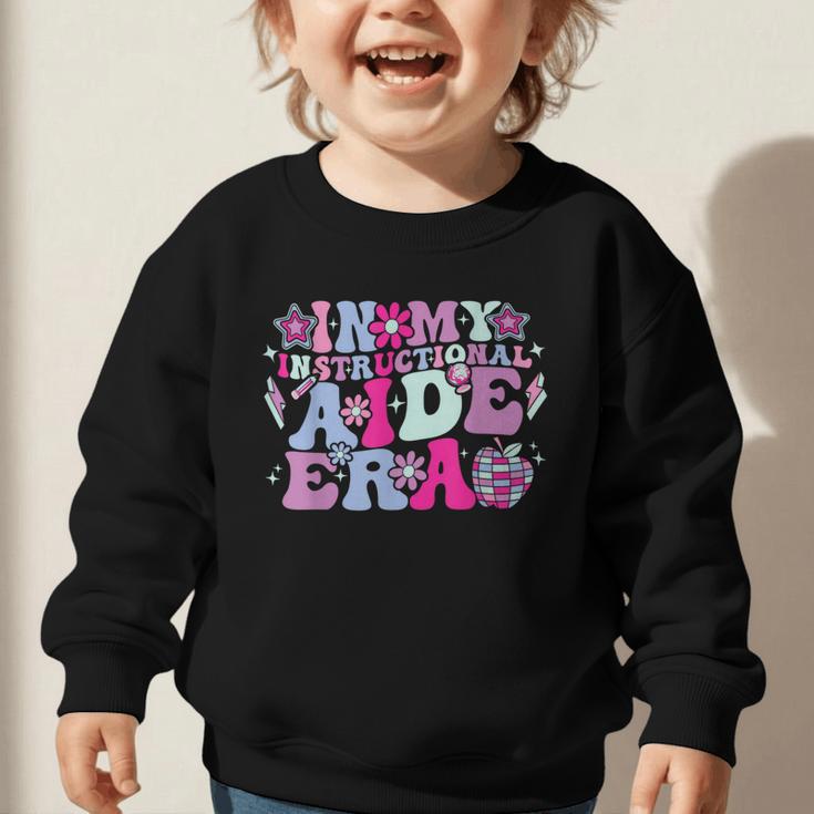 In My Instructional Aide Era Groovy Back To School Graphic Toddler Sweatshirt