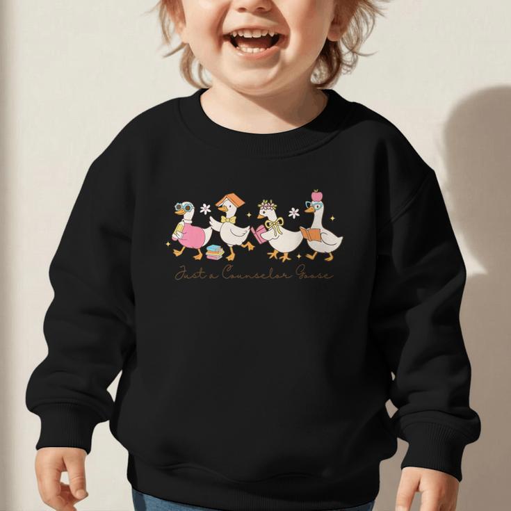 Just a Counselor Goose Back To School Silly Goose Counselor Graphic Toddler Sweatshirt Just a Counselor Goose Back To School Silly Goose Counselor Graphic Toddler Sweatshirt