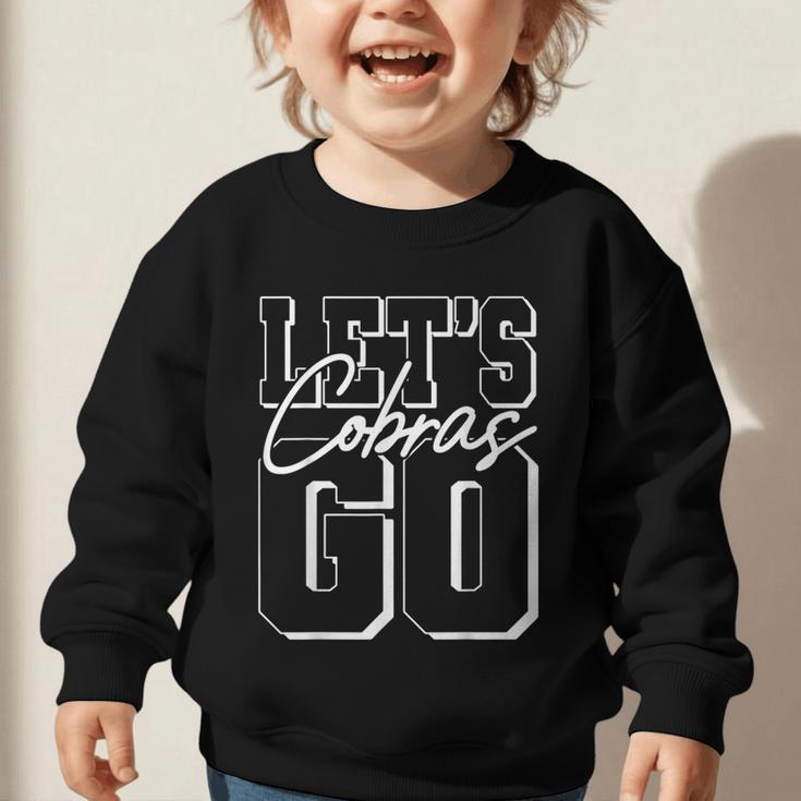 Let's Go Cobras Back To School Spirit Graphic Toddler Sweatshirt Let's Go Cobras Back To School Spirit Graphic Toddler Sweatshirt