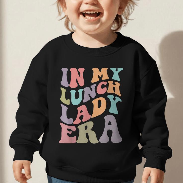 In My Lunch Lady Era Happy First Day Back To School Graphic Toddler Sweatshirt In My Lunch Lady Era Happy First Day Back To School Graphic Toddler Sweatshirt