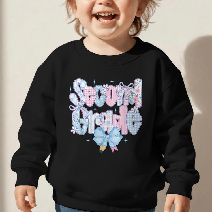 Preppy Second Grade First Day Back To School 2nd Grade Bow Graphic Toddler Sweatshirt Preppy Second Grade First Day Back To School 2nd Grade Bow Graphic Toddler Sweatshirt
