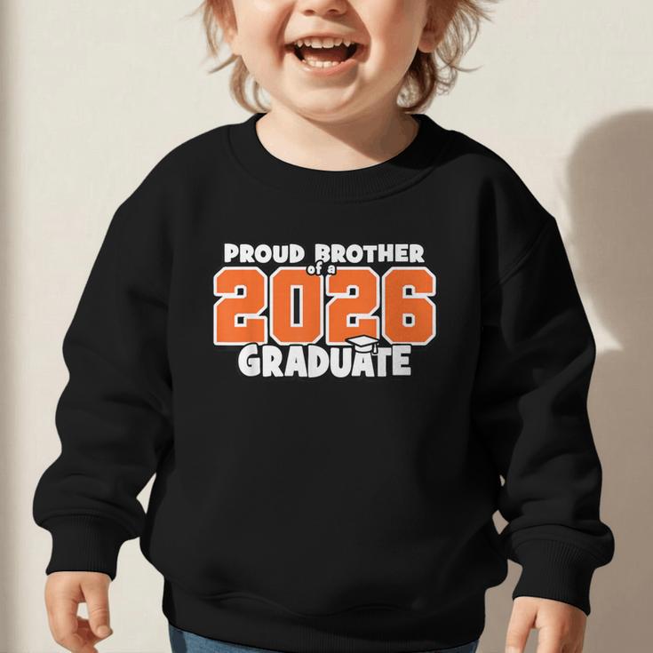 Proud Brother Of 2026 Graduate Matching Back To School O Graphic Toddler Sweatshirt