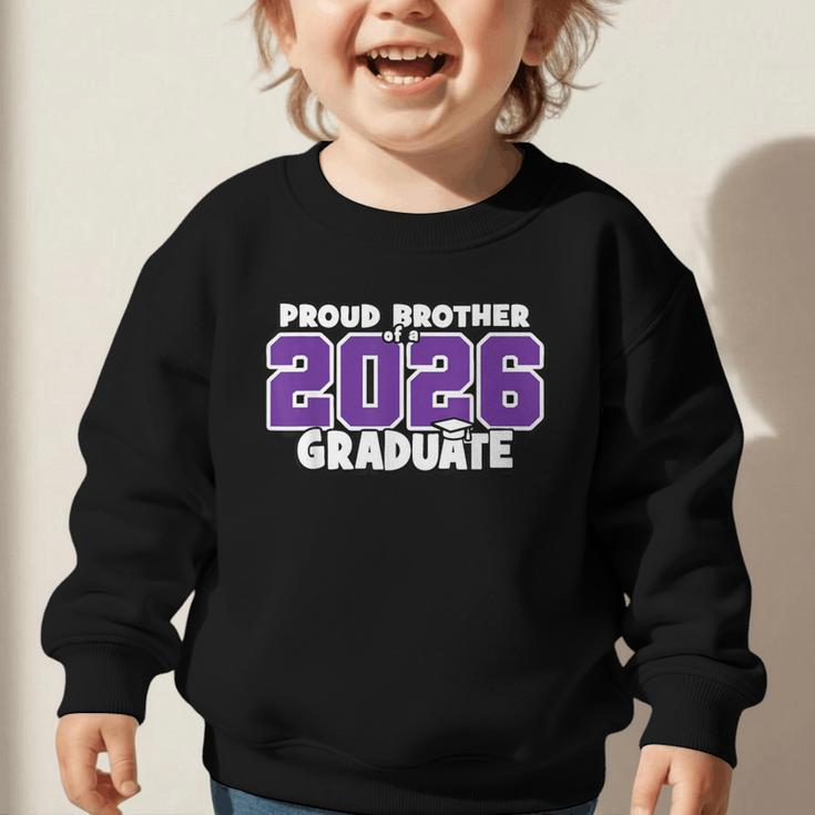 Proud Brother Of 2026 Graduate Matching Back To School P Graphic Toddler Sweatshirt
