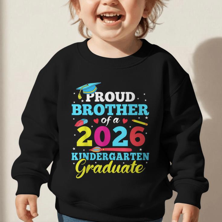 Proud Brother Of 2026 Kindergarten Graduate Back To School Graphic Toddler Sweatshirt Proud Brother Of 2026 Kindergarten Graduate Back To School Graphic Toddler Sweatshirt