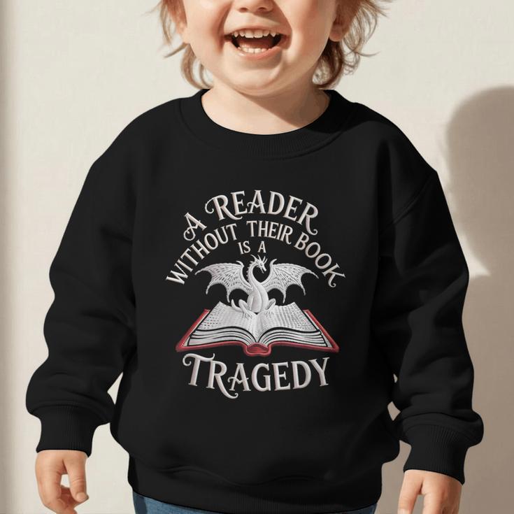 A Reader Without Their Book Is a Tragedy Back To School Graphic Toddler Sweatshirt A Reader Without Their Book Is a Tragedy Back To School Graphic Toddler Sweatshirt
