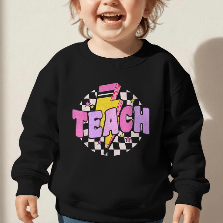 Retro Checkered Teach Pencil Lightning Back To School Graphic Toddler Sweatshirt Retro Checkered Teach Pencil Lightning Back To School Graphic Toddler Sweatshirt