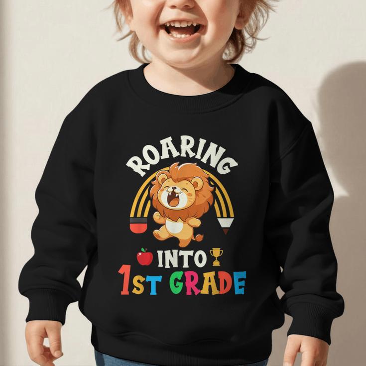 Roaring Into First Grade Lion 1st Grade Back To School Graphic Toddler Sweatshirt Roaring Into First Grade Lion 1st Grade Back To School Graphic Toddler Sweatshirt