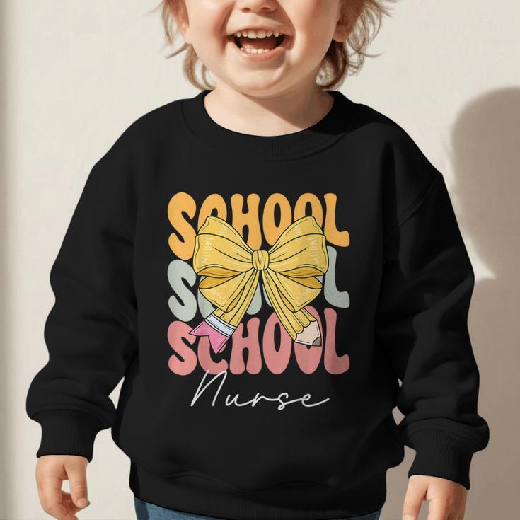 School Nurse Groovy Coquette Bow Cute Back To School Graphic Toddler Sweatshirt