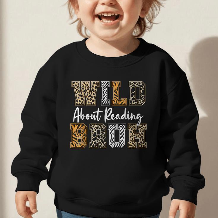 Wild About Reading Kid Love Wild Animal Books Back To School Graphic Toddler Sweatshirt Wild About Reading Kid Love Wild Animal Books Back To School Graphic Toddler Sweatshirt