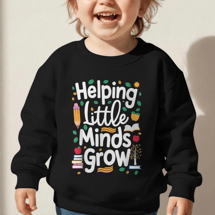 Women's Helping Little Minds Grow Back To School Apparel Graphic Toddler Sweatshirt Women's Helping Little Minds Grow Back To School Apparel Graphic Toddler Sweatshirt