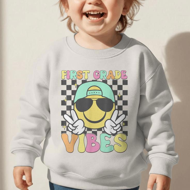 1st Grade Vibes Smile Face Back To School First Grade Graphic Toddler Sweatshirt 1st Grade Vibes Smile Face Back To School First Grade Graphic Toddler Sweatshirt