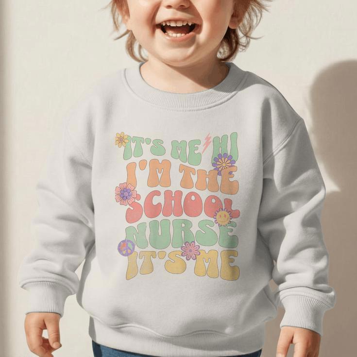 Back To School Nurse It's Me Hi I'm The School Nurse Graphic Toddler Sweatshirt Back To School Nurse It's Me Hi I'm The School Nurse Graphic Toddler Sweatshirt